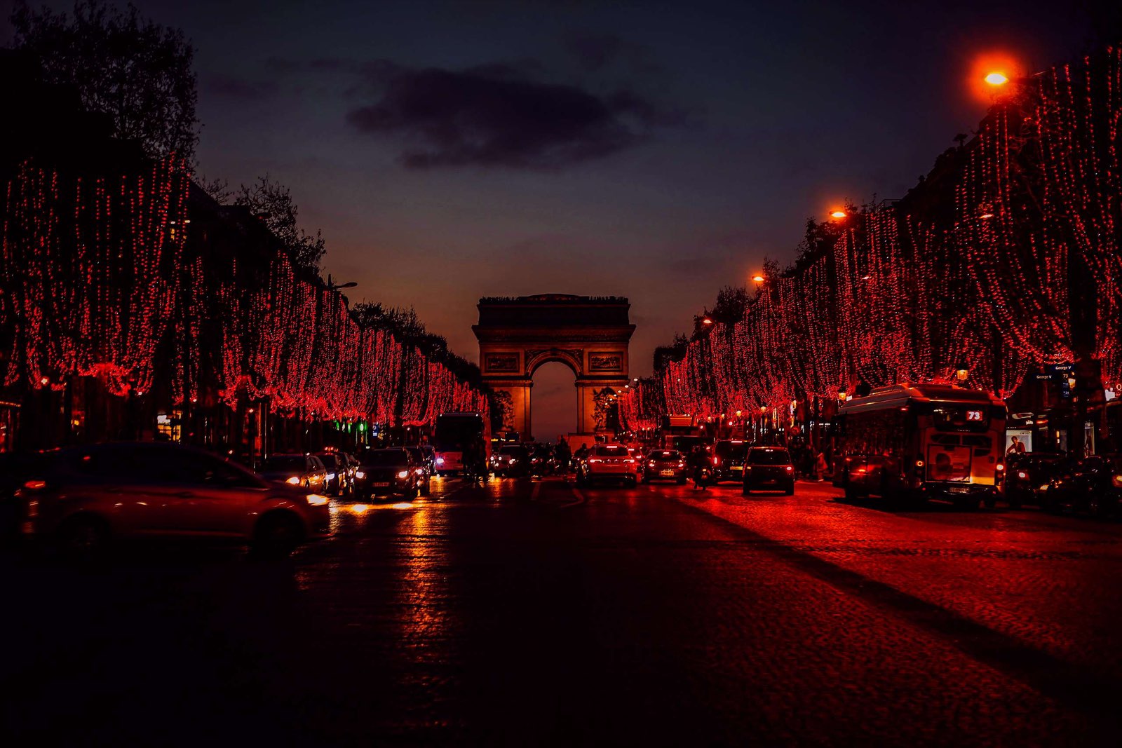 Christmas lights along the Champs-Elysees at dusk