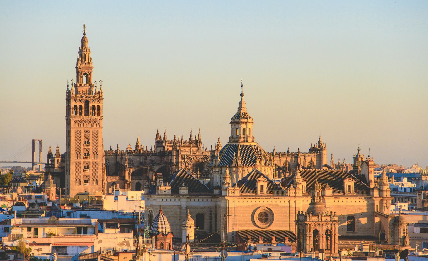 Seville Cathedral and the Giralda glowing above the historic city