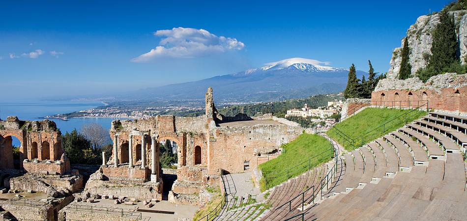 The Ancient Theatre in Taormina with Mount Etna beyond