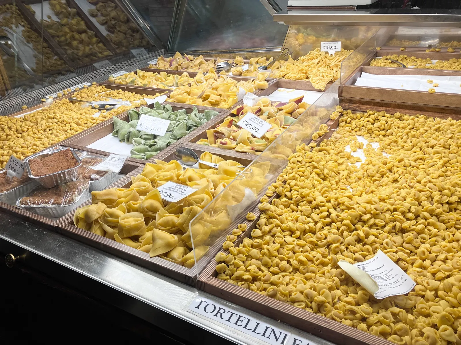 Fresh tortellini and regional pasta displayed in Bologna