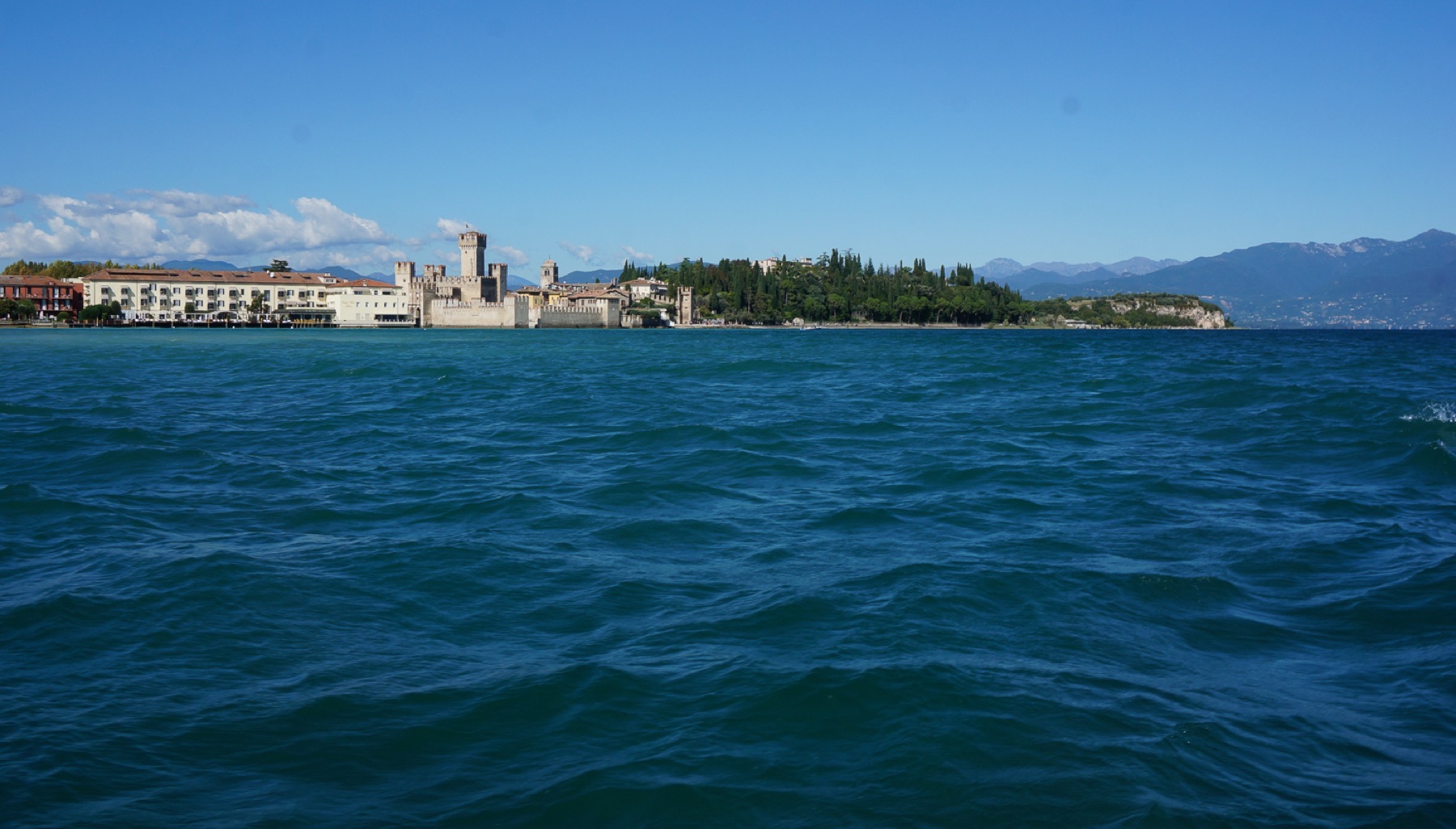 Sirmione peninsula seen from the water on Lake Garda