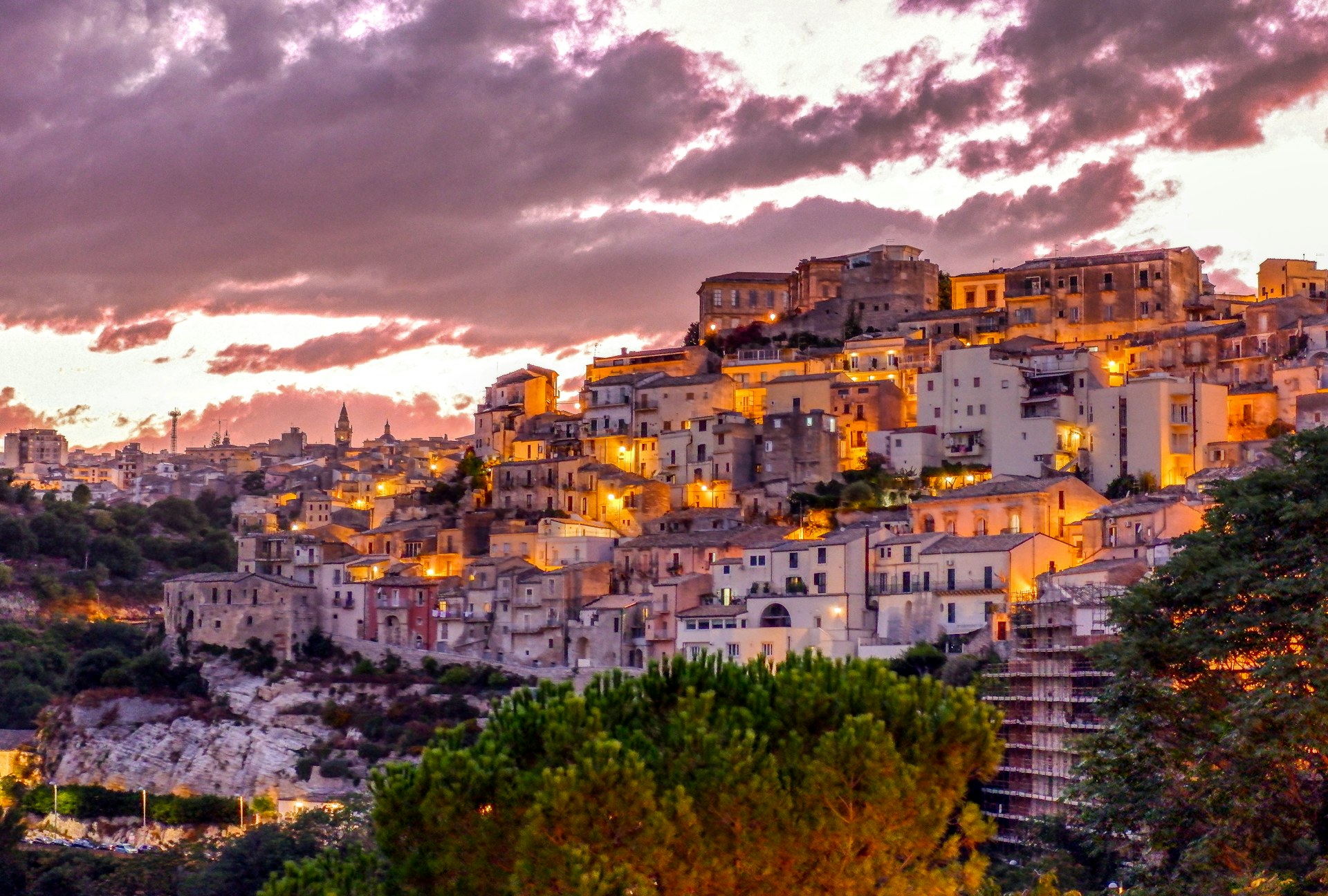 Ragusa Ibla glowing beneath a dramatic Sicilian sunset