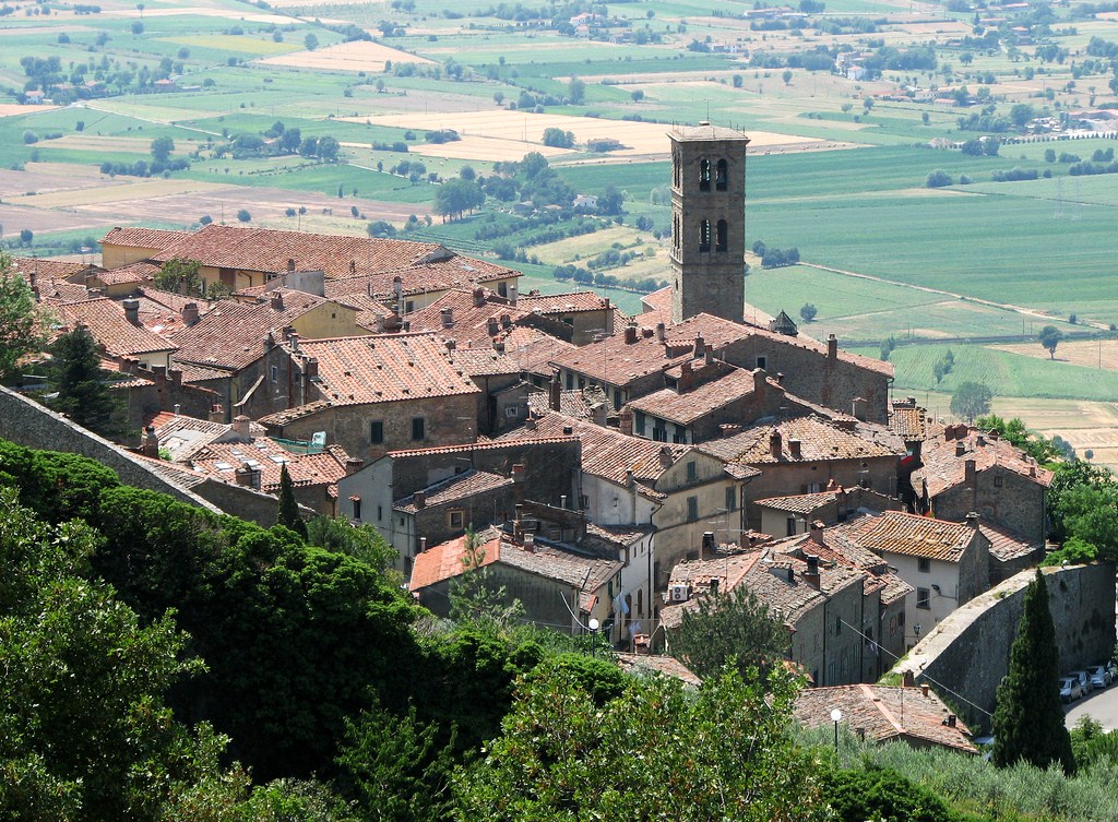 Cortona's hill-town rooftops overlooking the Tuscan countryside
