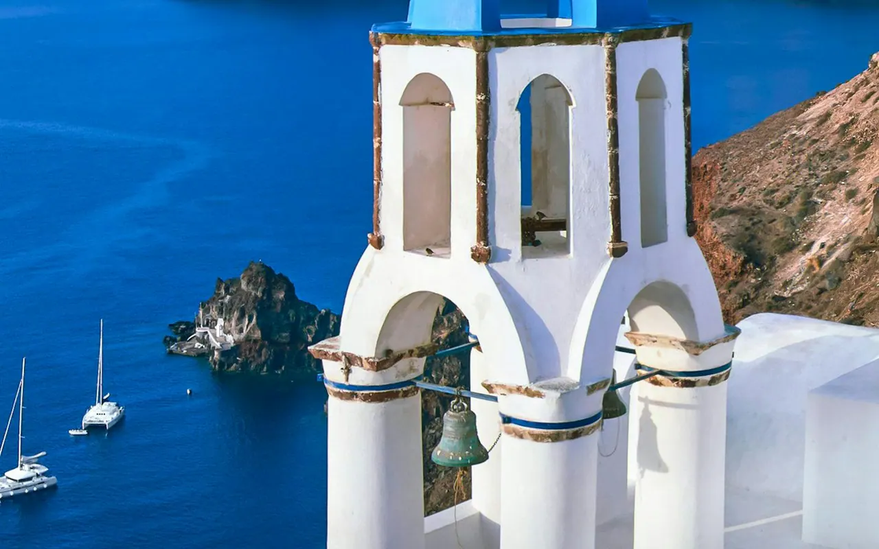 Santorini church and deep blue caldera